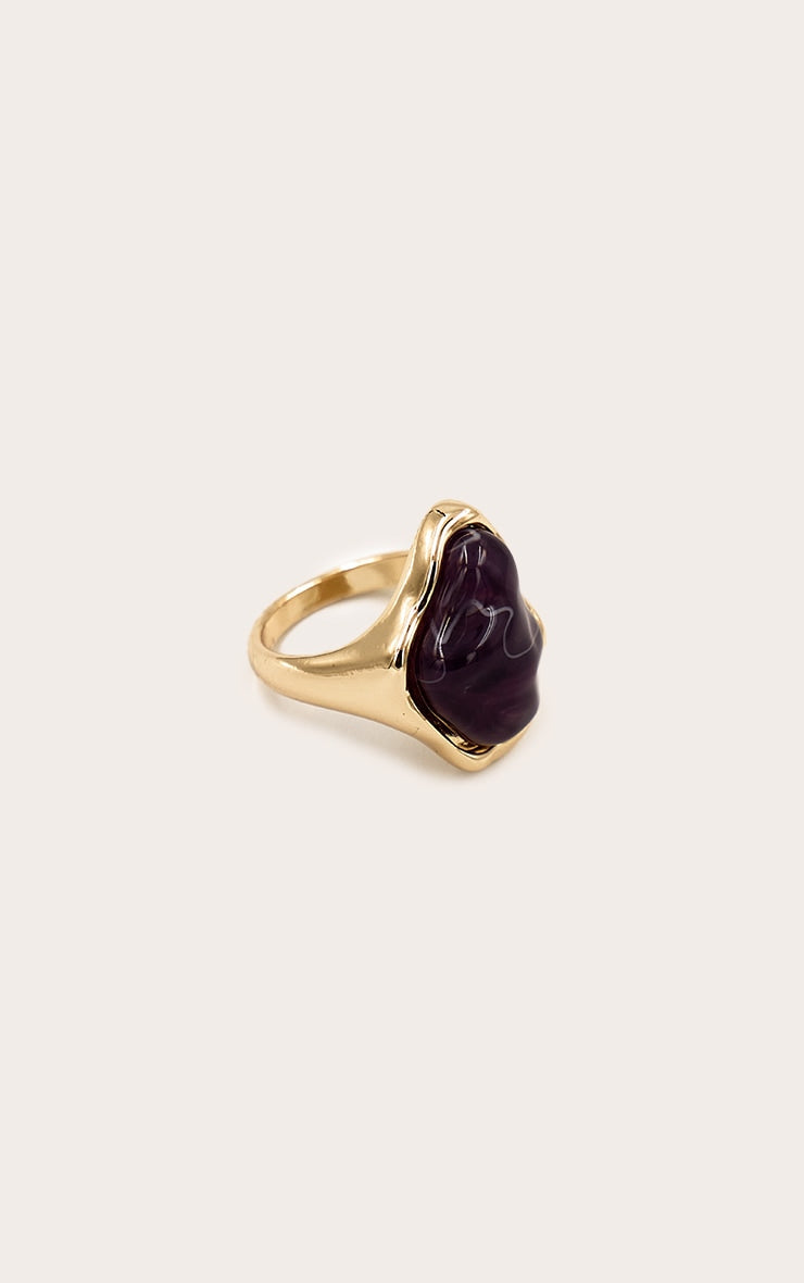 https://cdn-img.prettylittlething.com/a/8/1/1/a81191091a5766cda9885cb1b63920fbe0fd629c_CNO2922_2_gold_textured_purple_marble_ring.jpg